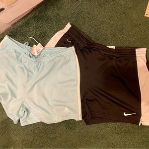 Bundle of Shorts size L. Nike black and one stripe size L and Adidas shorts.